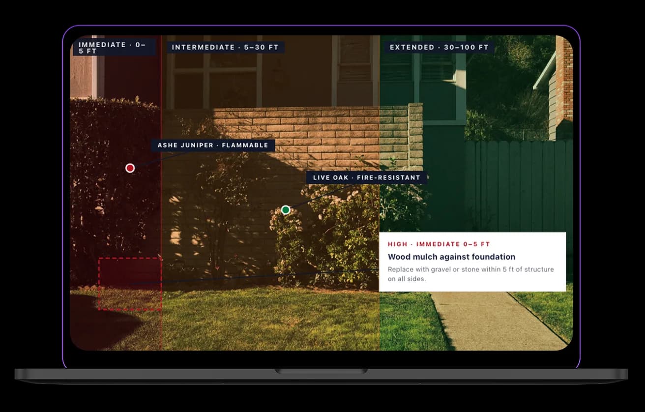 A laptop showing a Home Health Report photo with the three defensible-space zones marked and one finding called out